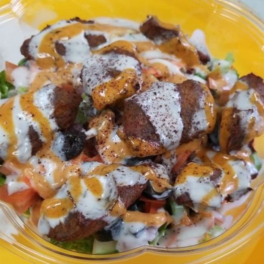 Falafel bowl with garlic and spicy sauce